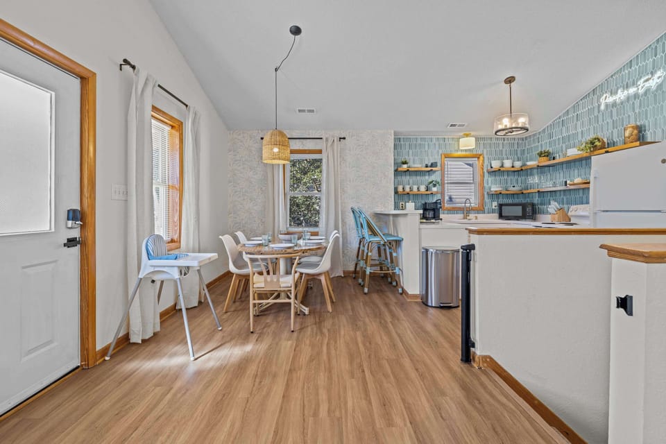 Designed for connection—our open floor layout creates a seamless flow between kitchen, dining, and living spaces. 