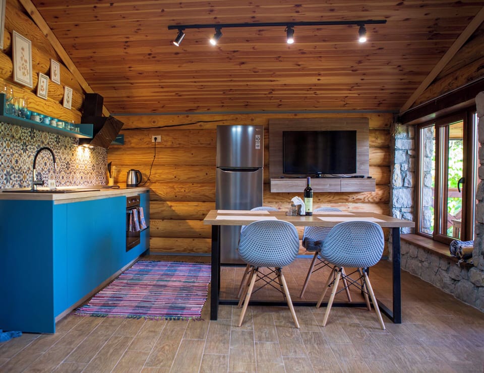 Modern, wooden kitchen with dining area 