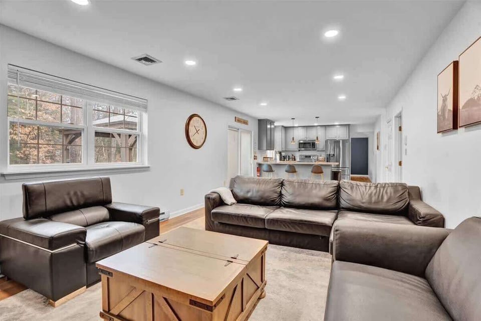 Spacious Living Room with Sectional Sofa & Fireplace