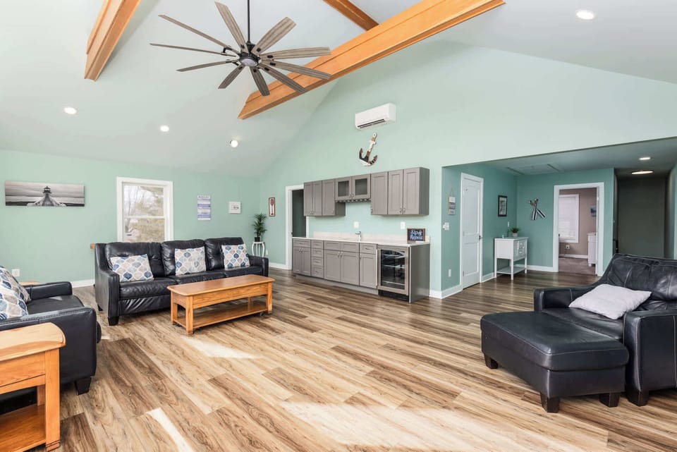 Top Level: Spacious Living Area with Wet Bar