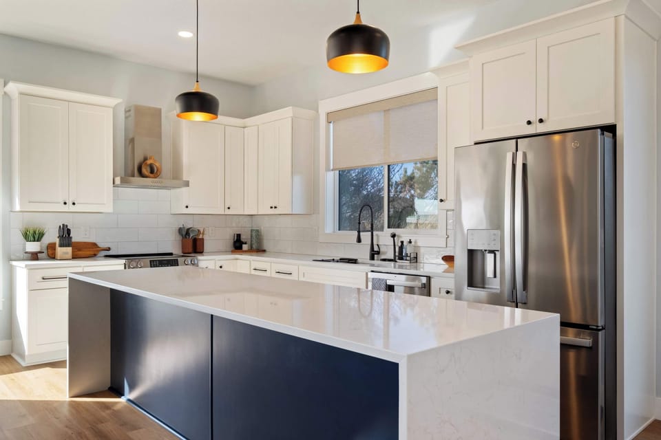 Spacious and central—plenty of prep space, seating, and everything you need to cook.