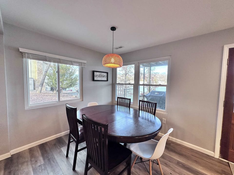 Gather for meals together at the dining table, with seating for up to 6