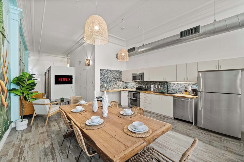 Sleek kitchen and dining area with contemporary finishes