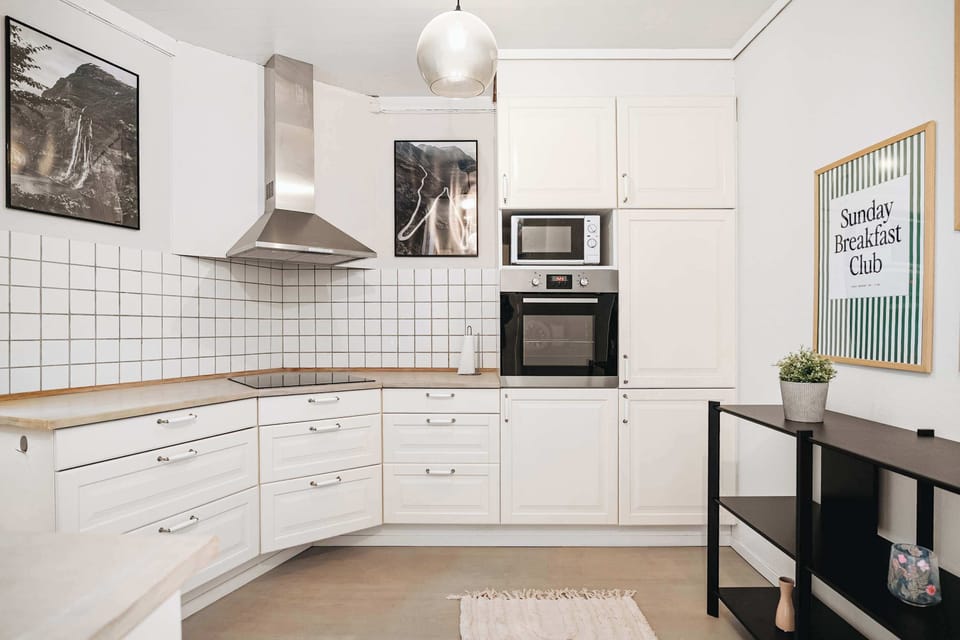 Spacious kitchen with modern appliances and bar seating