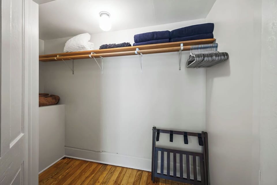 Ample storage in closet w/luggage racks & hangars 