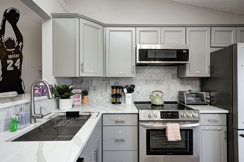 Stainless steel appliances, large double sink, & all the tools you need