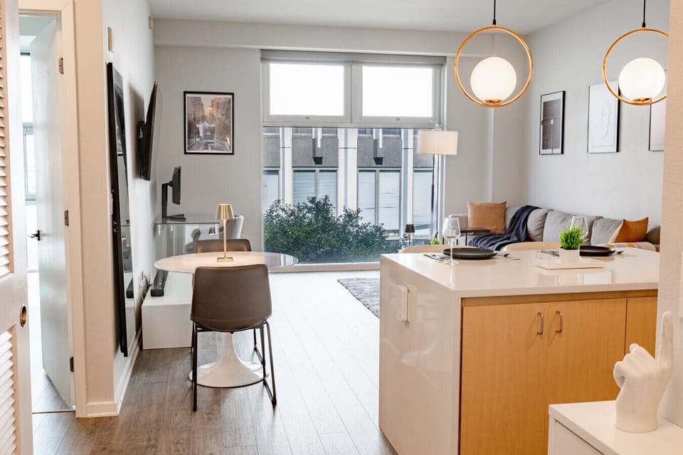 Gather around the spacious dining table for a meal or a casual chat.