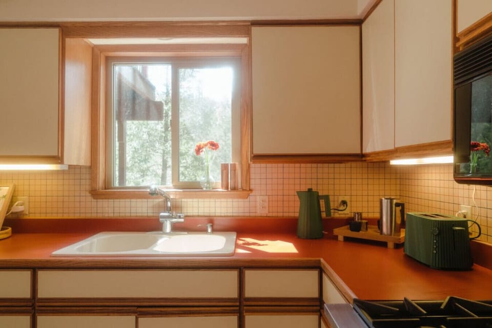 A thoughtfully stocked kitchen invites you to slow down and share nourishing meals, creating simple, meaningful moments together.