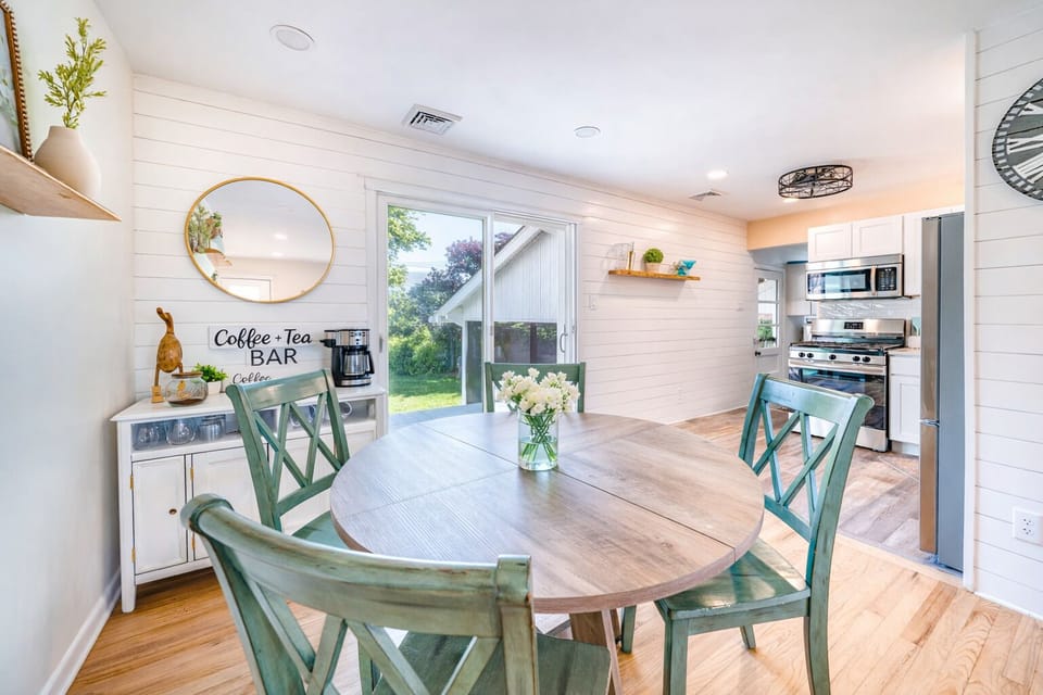Dining area with sliding doors to the deck and coffee & tea bar.