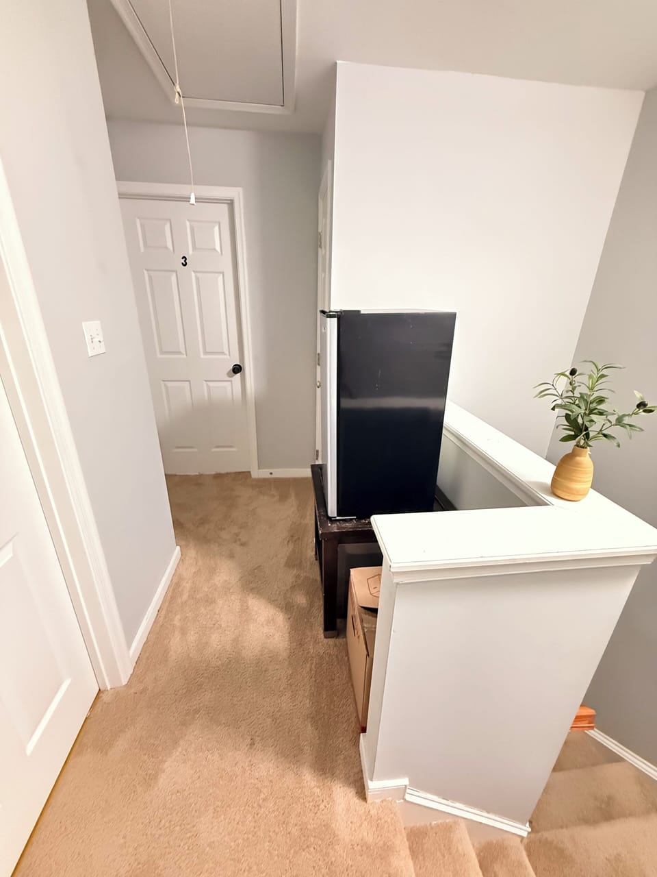 Mini fridge between bedrooms on the second floor