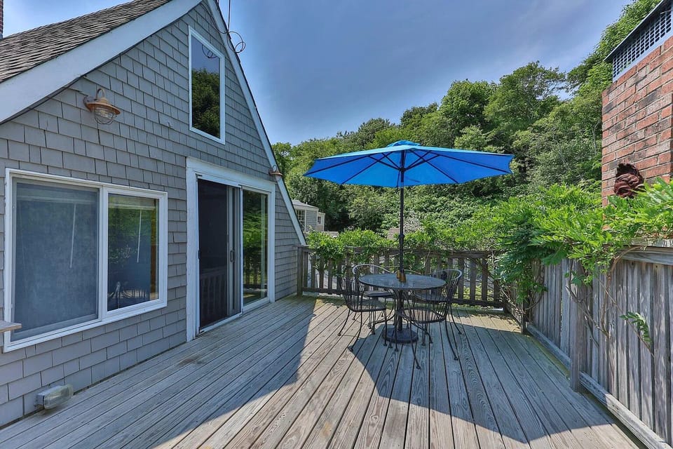2nd floor deck, sliding door from landing, foliage provides privacy
