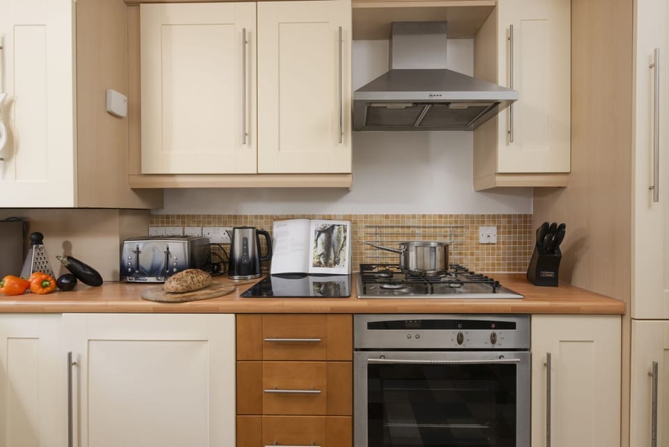 Oven and hob in kitchen - Bay View, Compass Point