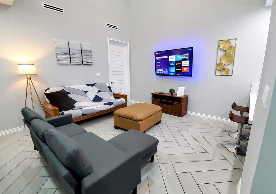 Living room with large Roku TV