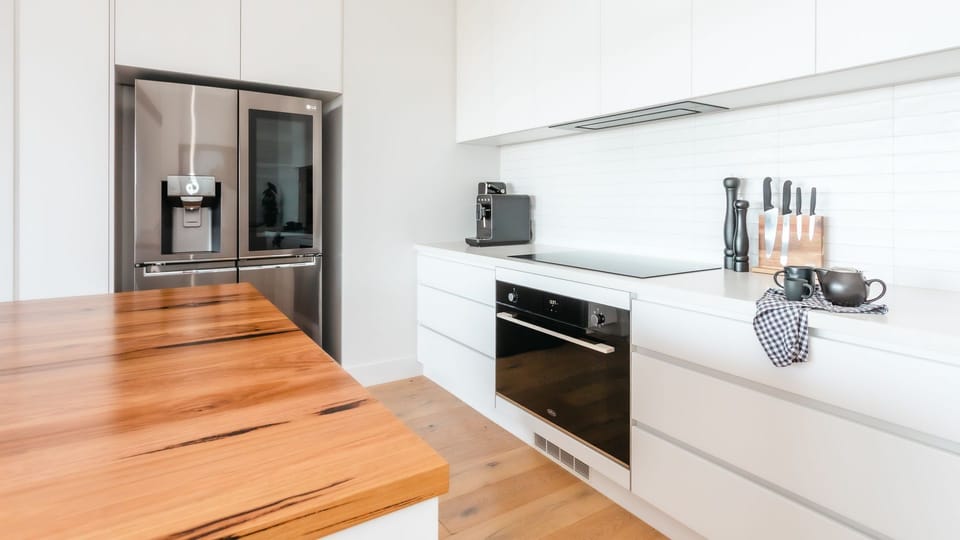900mm induction stove, electric oven, pod coffee machine, soda stream machine.