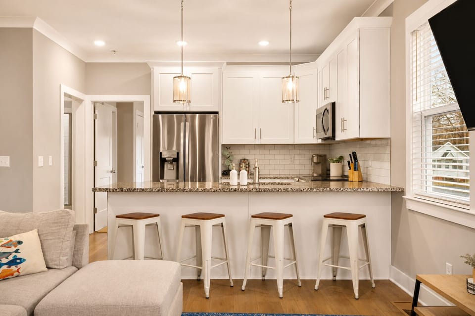 Spacious kitchen with stylish modern finishes.