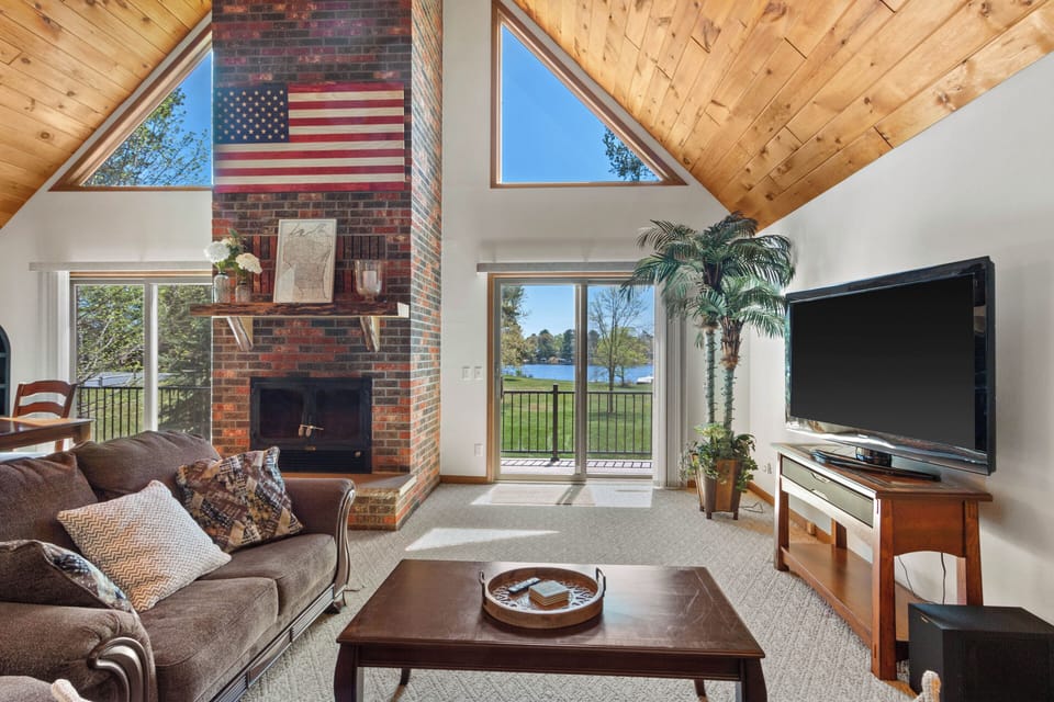 Upstairs living room with double patio doors. 