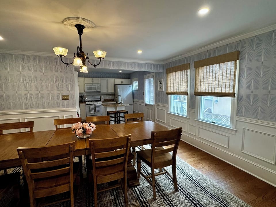 Dining room with seating for 10 and additional seating at the island