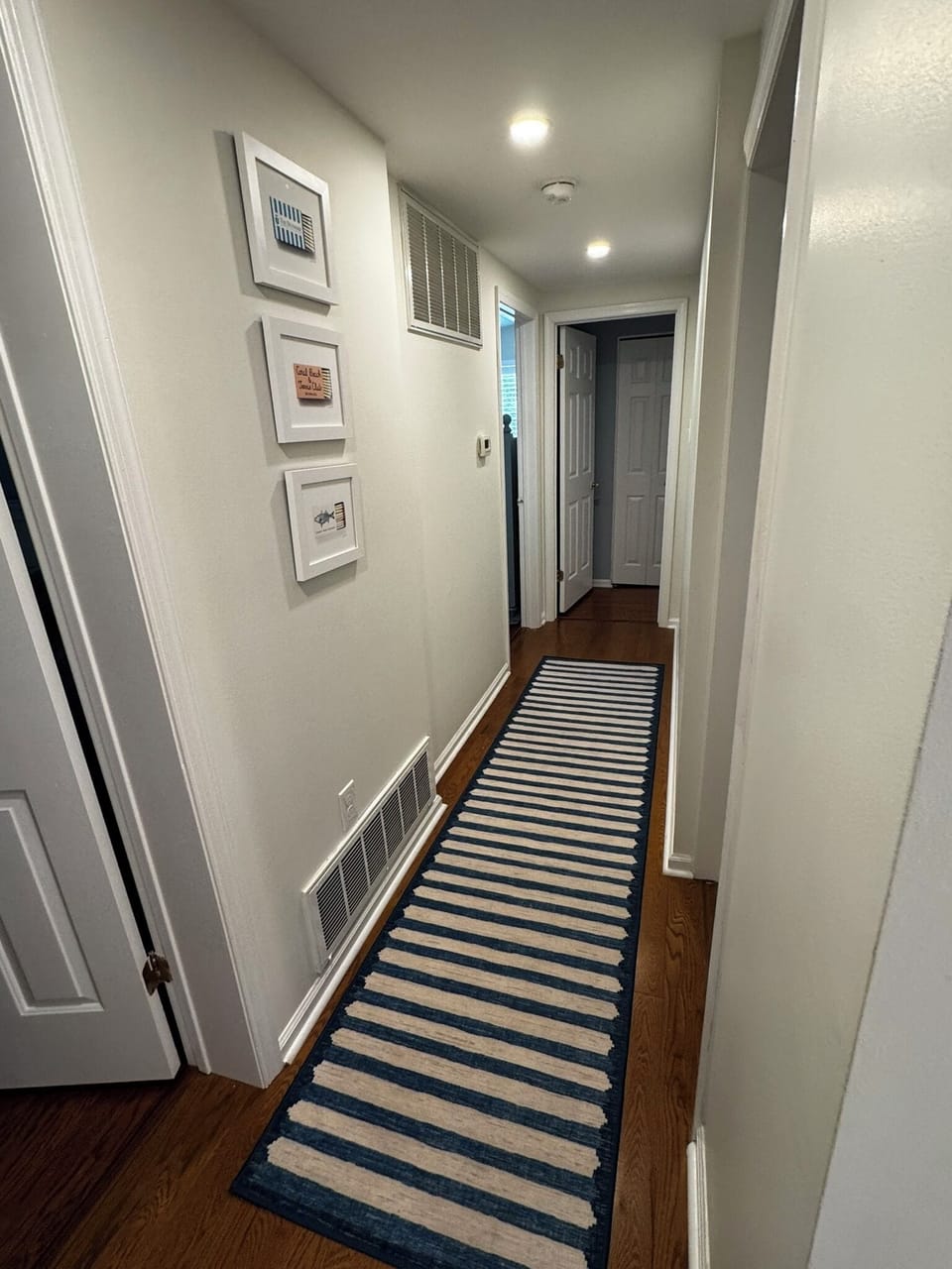 Downstairs back hallway to bedrooms and first floor washer and dryer