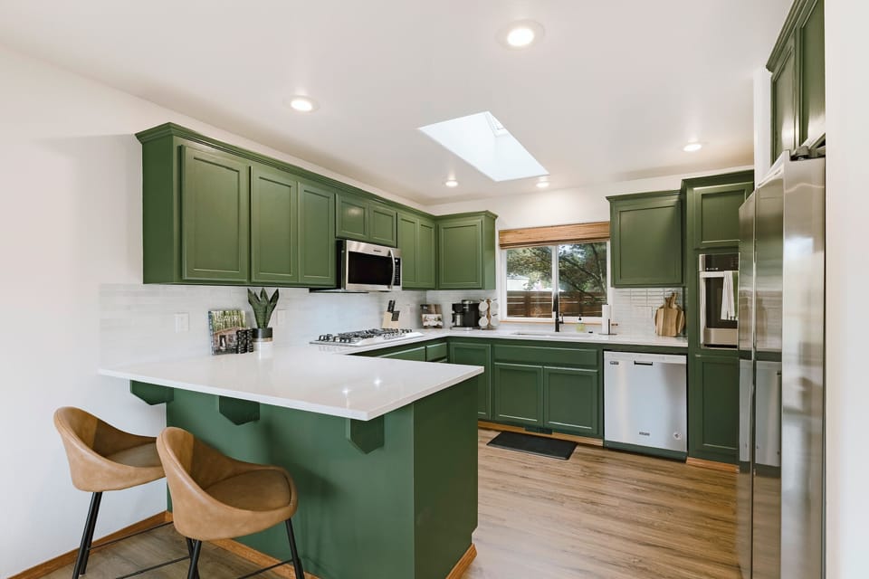 Fully equipped kitchen with all the essentials—from appliances to glassware.
