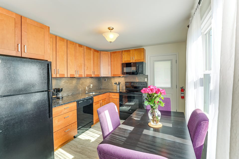 Kitchen & Dining Area | In-Unit Laundry | Central Heating & A/C