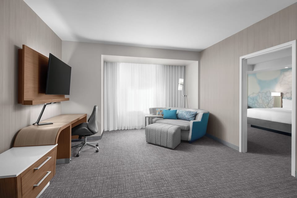 Work, lounge, and recharge in an airy sitting area.