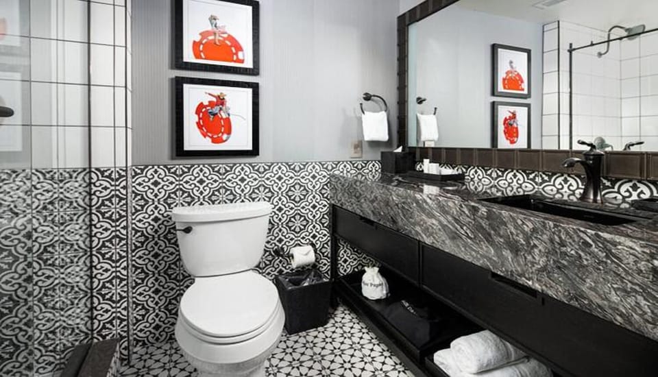Refresh easily in a stylish bath with bold tilework.