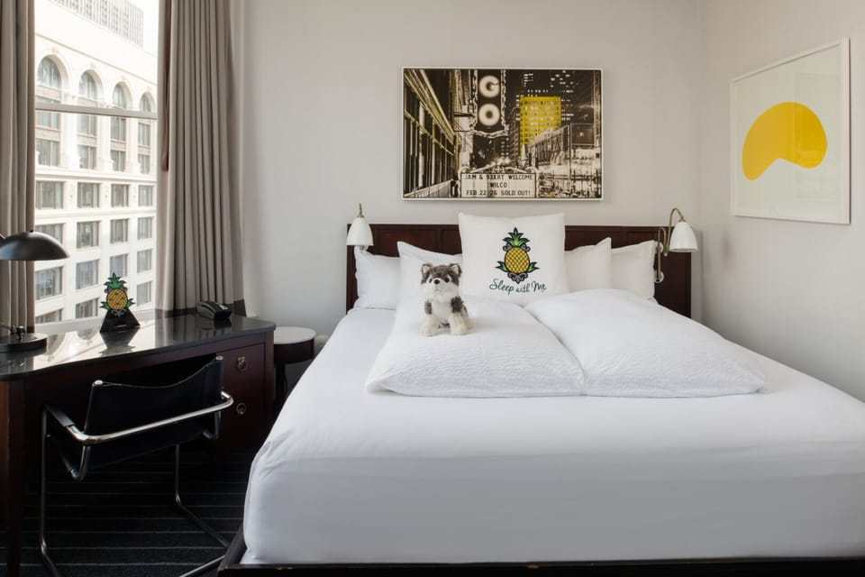 Drift off beneath stylish art with hotel-fresh comfort.