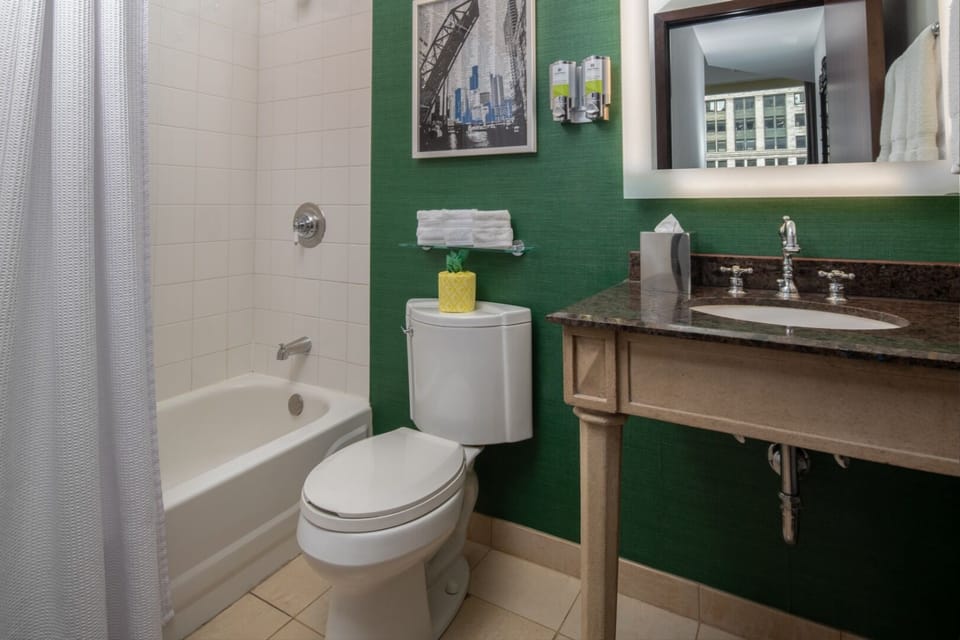 Refresh in a clean, bright bath with shower-tub combo.