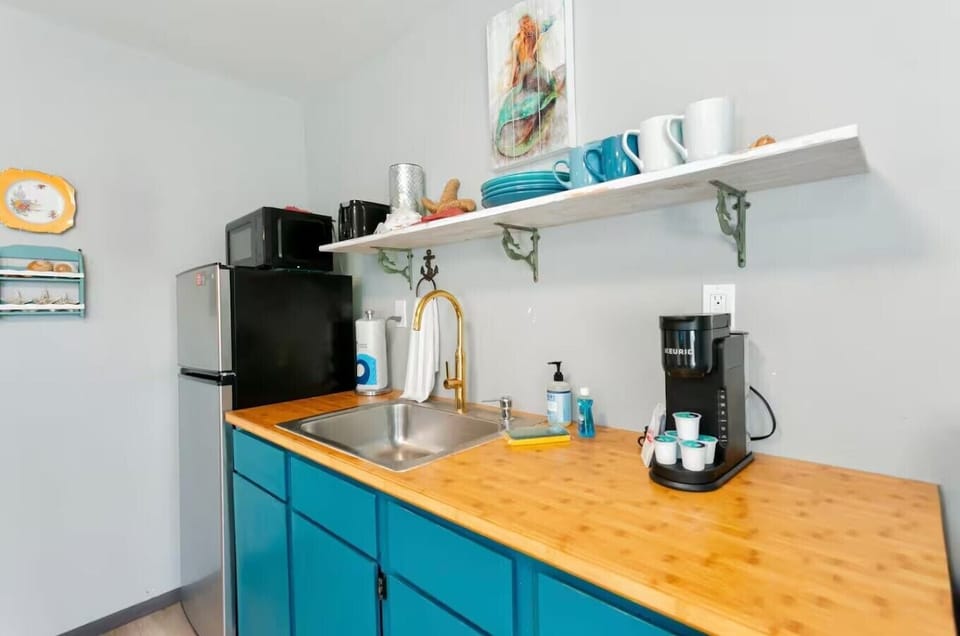 Bright kitchenette with colorful accents and everyday essentials