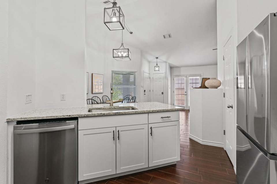 Kitchen looking towards living and dining area