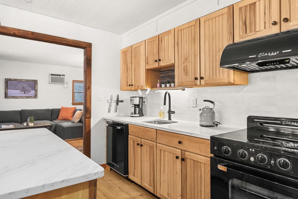 Kitchen features retro style coffee maker & tea kettle