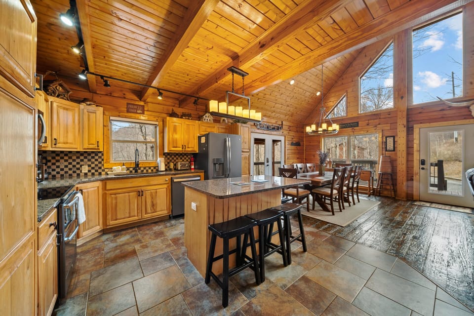 Spacious Kitchen with Granite Countertops and Plenty of Dining Space