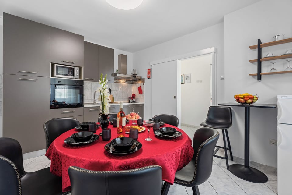 Well-equipped modern furnished kitchen for preparing own meals