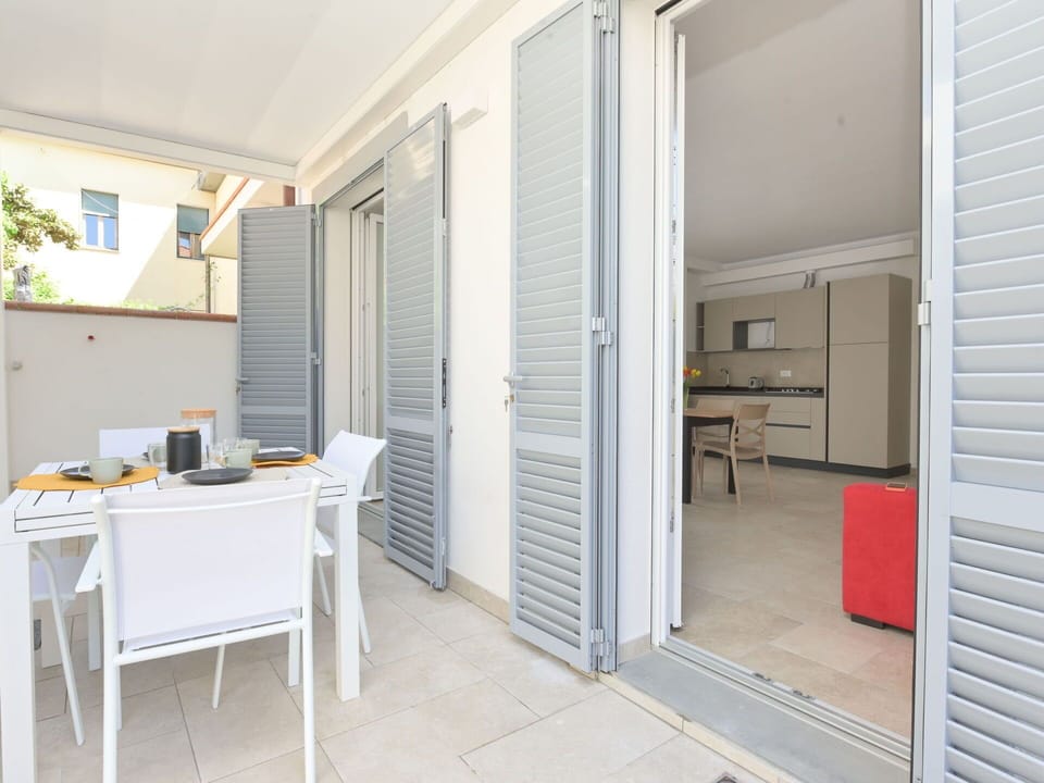 Flooring, Floor, Apartment, Wood Stain, Home Door, Chair, Balcony, Aluminium