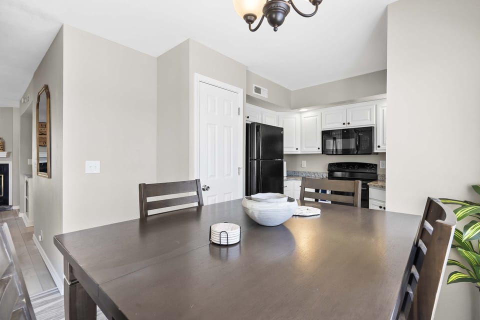 The open, airy kitchen offers ample space & every home comfort