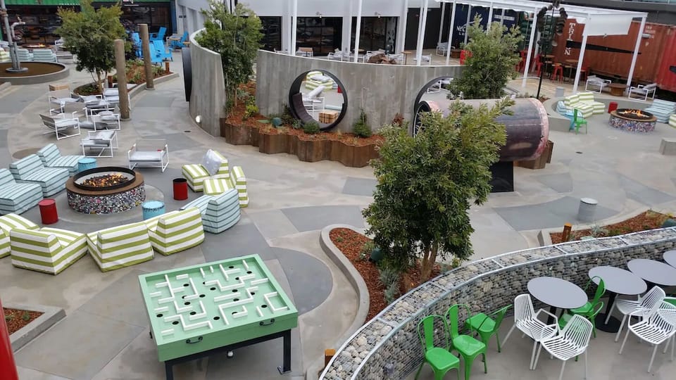 Play, lounge, and mingle in an expansive outdoor courtyard.