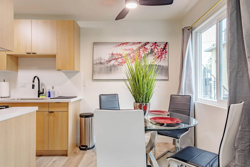 A fresh perspective of the bright dining area, emphasizing an inviting ambiance.