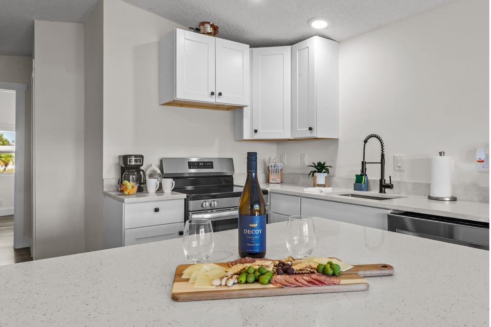 Bright and modern space, perfect for whipping up coastal cuisine with sleek appliances!