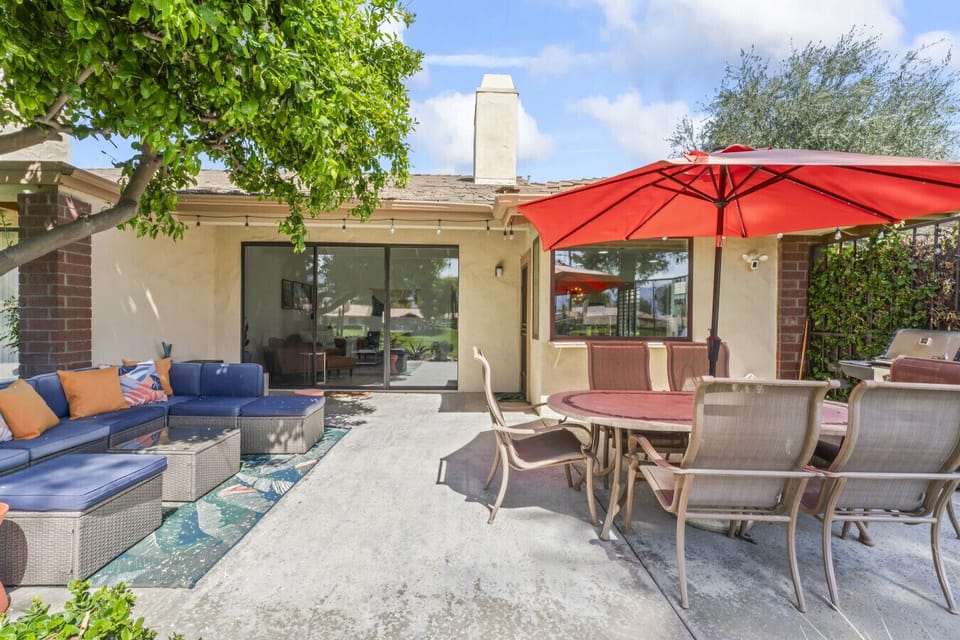 Private patio w/ lounge seating & dining area, perfect for relaxing outdoors