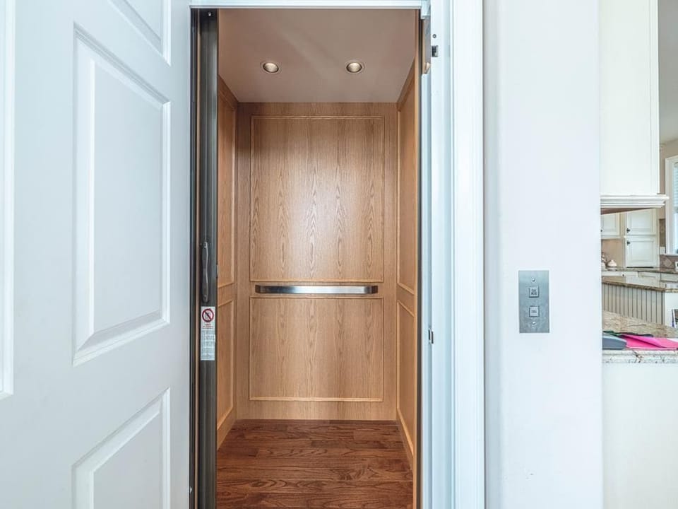Convenient in-home elevator for effortless access to all floors.