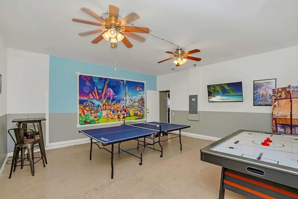 Disney-themed game room w/ ping pong & air hockey—family fun awaits!