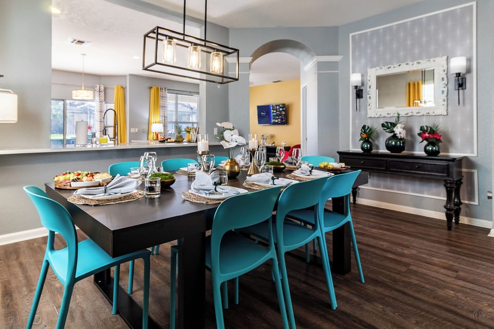 Elegant dining room w/ ‘Up’ art—perfect for family meals & celebrations.