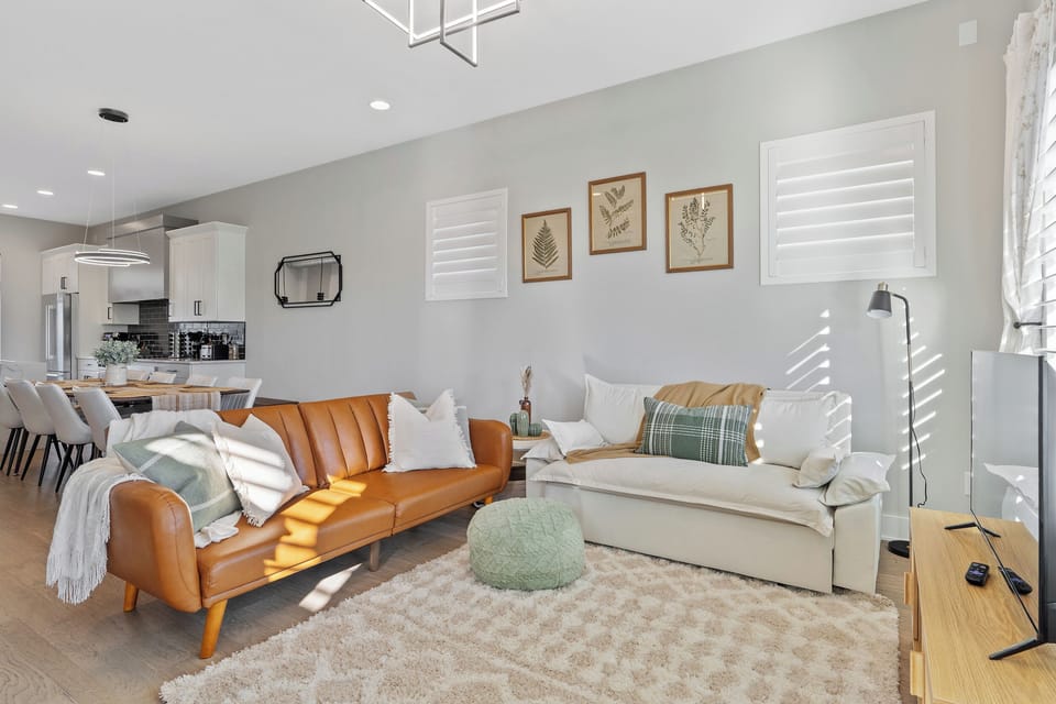 Spacious main floor living space! Two Cozy fold-out queenbed couches