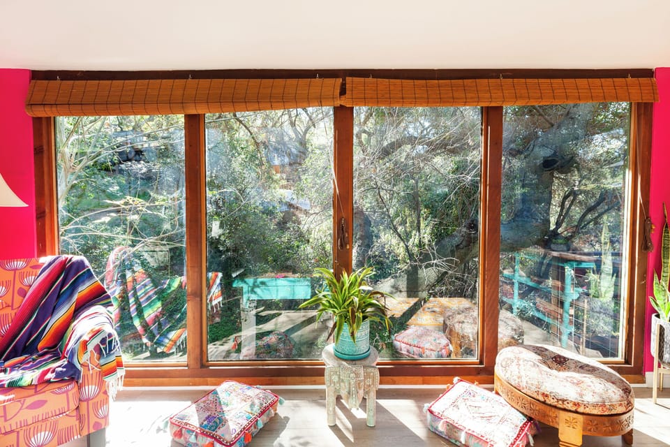 Living Room windows overlooking an ancient oak and the seasonal creek