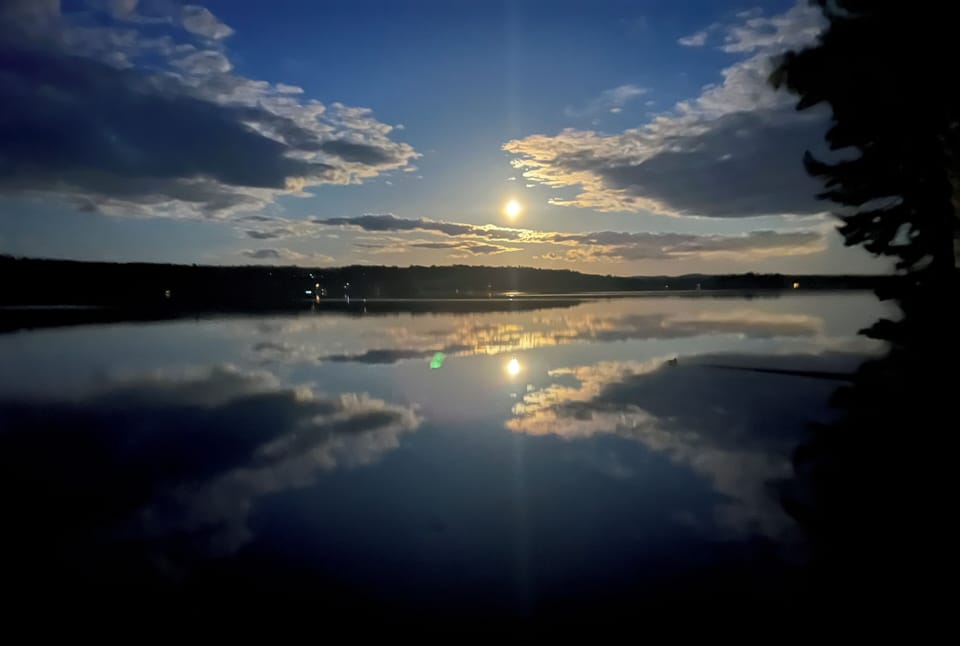 Good full moon rising over Long Lake
