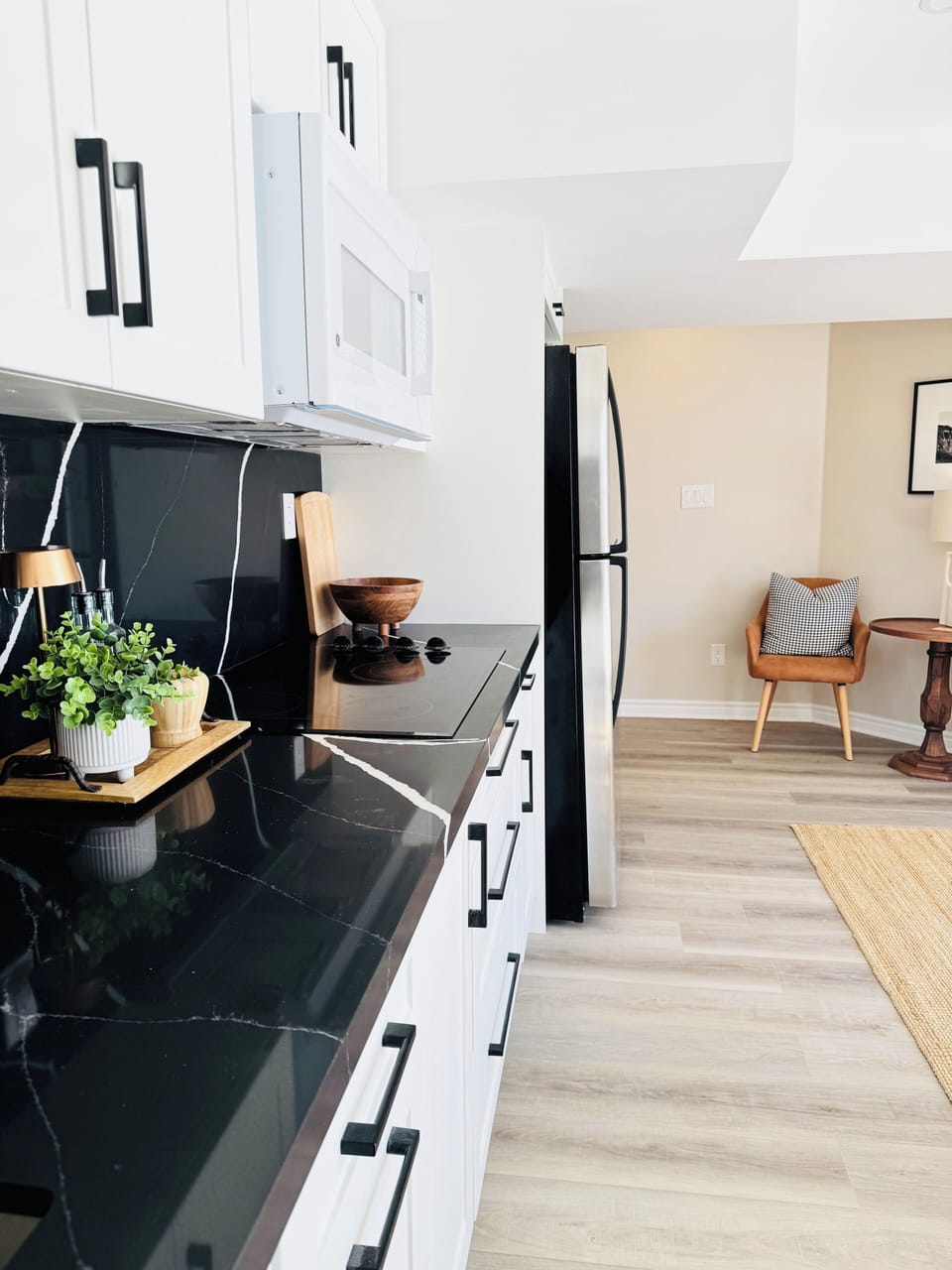 Full Kitchen with microwave, 4 pc cooktop, fridge, sink, oil, tea, coffee etc