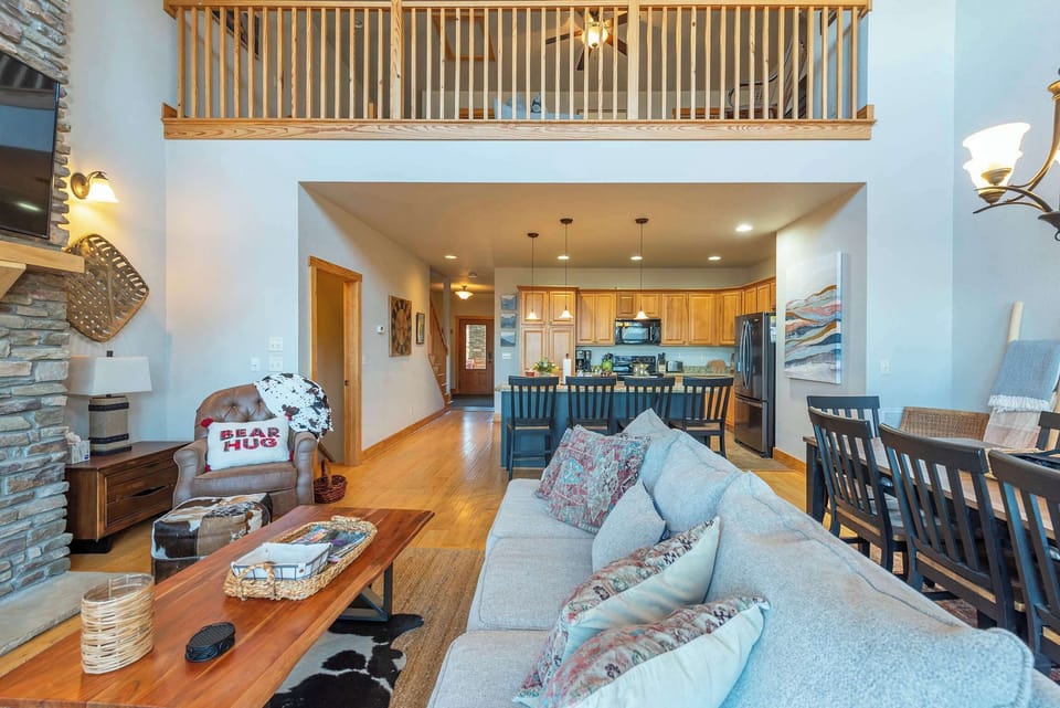 The living area flows effortlessly into the kitchen and dining spaces, making it easy to enjoy quality time together.