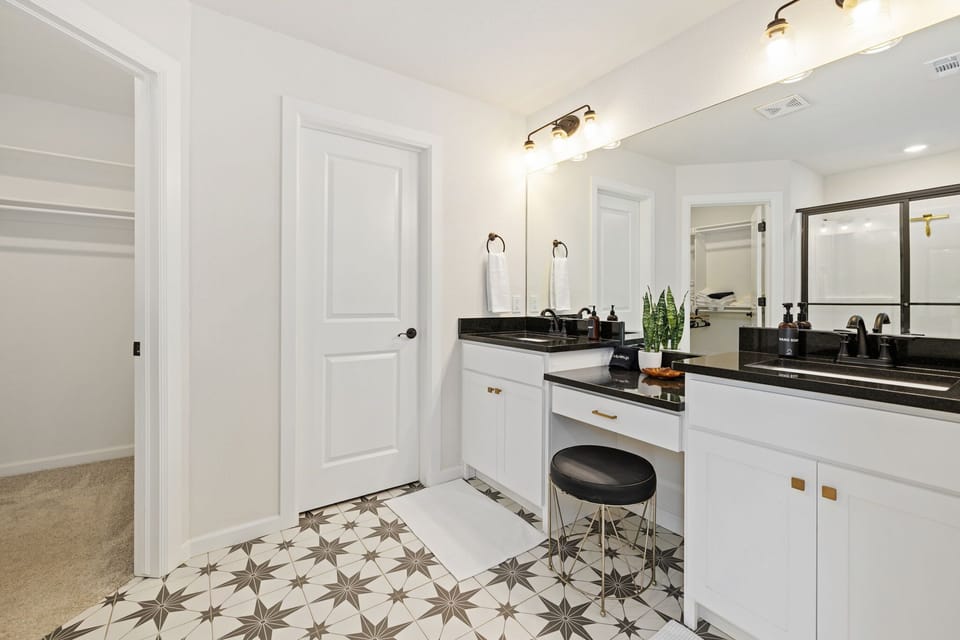 The primary bedroom features an en suite bathroom.