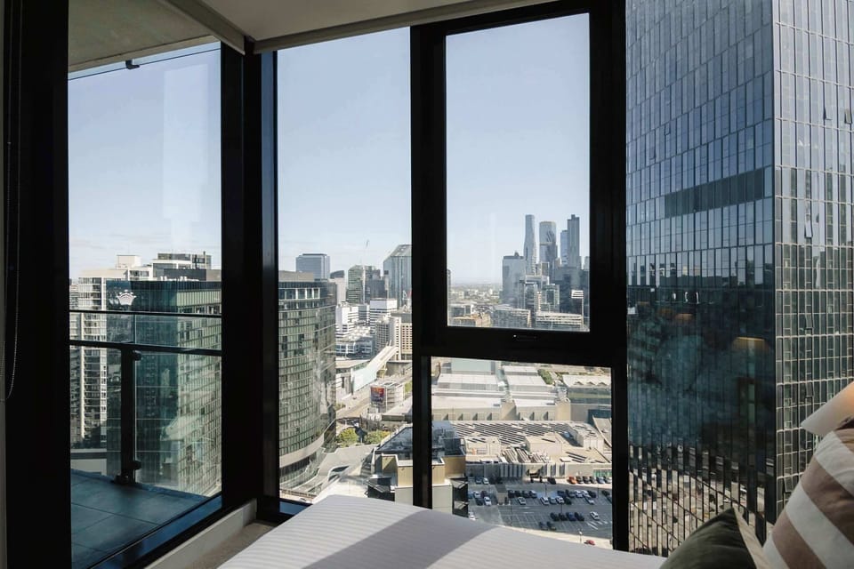 Second Bedroom with City Views, built in mirrored robes and access to the bathroom