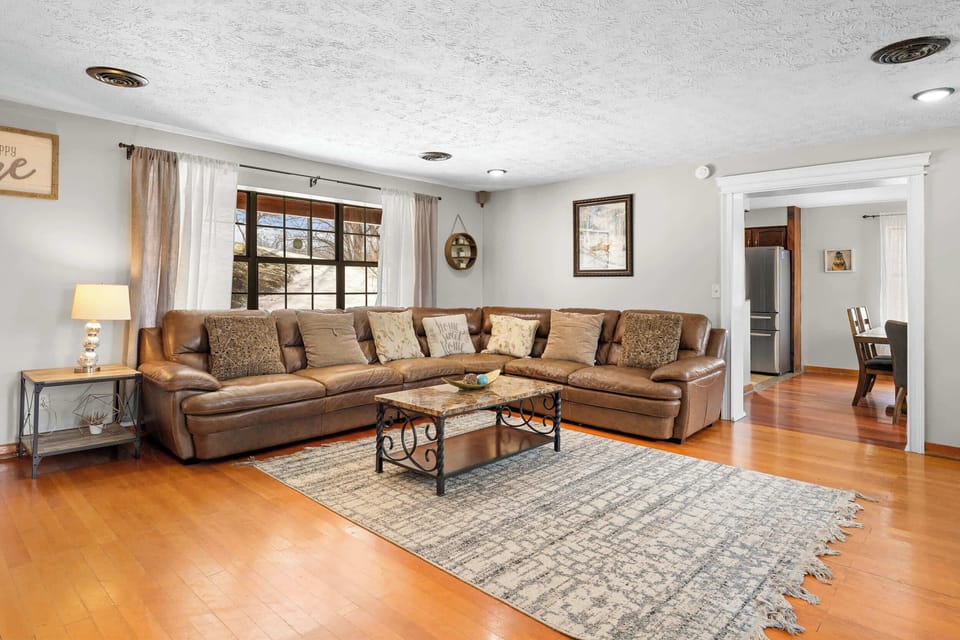 Living area with ample seating and Smart TV